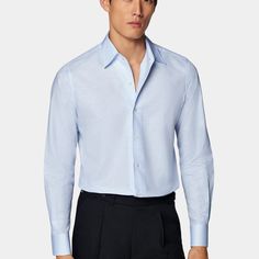 Find the height of spring style & comfort in this breezy light blue shirt. Tailored slim with ultra-fine stitching, a softly structured collar, and a sleek, semi-tailored waist for a casually polished silhouette. Elegant Blue Slim Fit Shirt, Elegant Slim Fit Blue Shirt, Light Blue Long Sleeve Shirt For Semi-formal Occasions, Elegant Blue Slim Fit Top, Solid Dress Shirt With Spread Collar For Spring, Spring Solid Dress Shirt With Spread Collar, Solid Spring Dress Shirt With Spread Collar, Spring Solid Color Dress Shirt With Spread Collar, Formal Slim Fit Light Blue Shirt