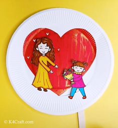 a paper plate with a drawing of a man and woman holding hands in front of a heart