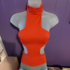 Brand New Silky Stretchy Cut Out Top. Visit Our Store For Thousands Of Items You Wont Find Anywhere Else! All Prices Negotiable & Deep Discounts On Bundles! Great Free Gifts With Every Purchase! Fitted Orange Top For Night Out, Red Casual Tops For Club, Cut Out Top, Free Gifts, New Color, Cut Out, Black And Red, Top Blouse, Bundles