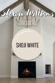 a living room with a fireplace and chandelier above it that says shoji white