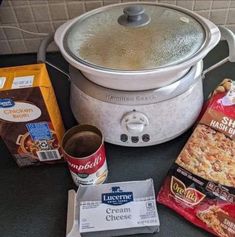 an electric crock pot with ingredients to make it into a casserole dish