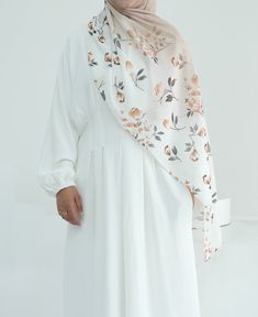 Crafted from premium quality chiffon, this hijab exudes both luxury and modesty. The delicate fabric has a silky smooth texture and is lightweight, effortlessly falling into an elegant floral pattern. Modest Activewear, Full Coverage Swimsuit, Abaya Dress, Floral Scarf, Elegant Floral, Smooth Texture, Active Wear Tops, Trousers Women, Floral Pattern