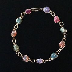 Vintage Boho 70’s Lovely Genuine Gemstone Wire Cage Wrapped Multi Color Natural Stones In Gold Tone Metal Bracelet Features 11 Tumbled Stones Including Amethyst, Carnelian, Green Aventurine And Other Agates Each Stone Is Wrapped & Soldered In Gold Tone Wire & Connected By Jump Rings, Measuring 7.75”. Beautiful On The Wrist, Wear Alone Or Stack With Your Other Favorites, Locks With Old Style/Snap~Hook, Unsigned. This Is In Perfect Nwot Condition, Was A Gift 40+Years Ago, Just Stored! Cool Wire Jewelry, Diy Wire Jewelry Rings, Aventurine Jewelry, Multicolor Bracelet, Wire Jewelry Rings, Wire Jewelery, Face Jewellery, Wrist Wear, Wire Wrapped Bracelet