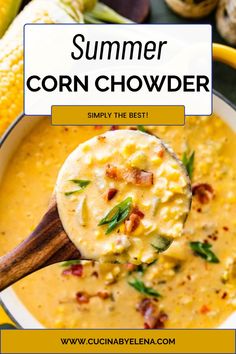 a bowl of corn chowder with a spoon in it