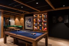 a pool table in the middle of a room