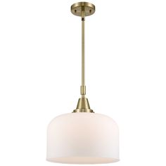 a light fixture with a white glass shade on the bottom and an antique brass finish