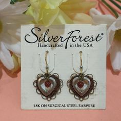 Layered Gold And Silver Hearts On 18k Gold Plated Surgical Steel Earwires From Silver Forest Are Handcrafted In The Usa. A Dainty Carnelian Colored Bead Rests In The Center Of The Heart. Approximately 1-1/4" Long. Metal Heart Pendant Earrings For Anniversary, Nickel-free Metal Heart Earrings For Anniversary, Nickel Free Metal Heart Earrings For Anniversary, Nickel-free Open Heart Metal Earrings, Nickel-free Metal Heart Earrings For Valentine's Day, Metal Open Heart Earrings For Gift, Metal Open Heart Earrings For Anniversary, Metal Heart Earrings For Mother's Day, Pierced Open Heart Metal Jewelry