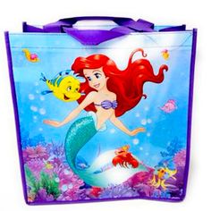 the little mermaid lunch bag is blue and has an image of ariel from the little mermaid on it