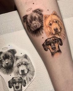 three dogs are shown on the arm and one has a dog's face painted on it