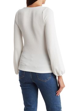 Refresh your essentials with this square-neck top cut from a stretchy ribbed knit with gently puffed long sleeves. 23" length (size Small) Square neck Long sleeves with elastic cuffs 97% polyester, 3% spandex Machine wash, line dry Made in the USA Model stats: 5'10" height, 32" bust, 25" waist, 36" hip. Model is wearing size Small. White Ribbed Square Neck Top, Ribbed Puff Sleeve Top For Fall, Fall Ribbed Puff Sleeve Top, Ribbed Knit Puff Sleeve Top, Ribbed Knit Tops With Puff Sleeves, Casual Ribbed Puff Sleeve Top For Spring, Spring Ribbed Puff Sleeve Top, Ribbed Square Neck Tops For Fall, Ribbed Square-neck Tops For Fall