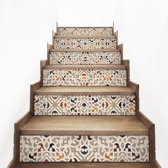 a set of stairs with decorative tiles on them