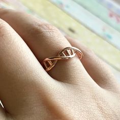 Rose Gold DNA Ring, Christmas Gift, Sterling Silver, Molecule Ring, Chemistry Jewelry, Gift For Doctor, Helix ring, Unisex Ring, Science Ring ♥MATERIALS ♥ High Quality Solid 925 Sterling Silver For solid gold pieces we use 14k real solid gold ♥FINISH♥ Silver- Gold- Rose Gold ♥ SIZE ♥ US5-US5.5-US6-US6.5-US7-US7.5-US8-US8.5-US9-US9.5-US10 ♥ How to customize Order? ♥ 1) Select Finish 2) Select ring size 3) Click "Add to Cart" 4) Please write the date to the text box.  5) Checkout 6) Complete order Dna Ring, Dna Necklace, Chemistry Jewelry, Dna Jewelry, Spiral Jewelry, Helix Ring, Gift For Doctor, Petite Ring, Personalized Mother's Day Gifts