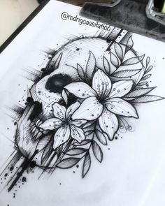 a drawing of a skull with flowers on it