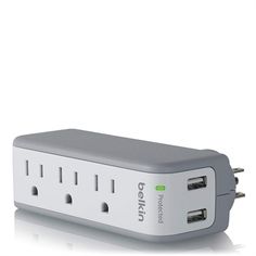 the power strip is plugged in to an external charger with two usbs