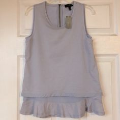 Nwt J Crew Ruffle Tank Top Shirt Size: Xxs Color: Lavender Bust 16” Length 23” Purple Cotton Top For Layering, Purple Top For Spring Layering, Summer Workwear Lavender Blouse, Lavender Summer Workwear Blouse, Summer Lavender Blouse For Workwear, Sleeveless Lavender Ruffled Top, Chic Lavender Tops With Ruffles, Chic Lavender Top With Ruffles, Lavender Tops For Spring Layering