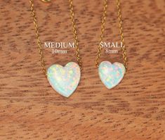 "Opal heart necklace - love necklace - valentines necklace - gold heart necklace - silver heart necklace A stunning opal heart hanging happily from a 16 inch 14k gold vermeil chain. Please feel free to select a different length chain if you prefer! Also available on a sterling silver chain... There are 2 hearts to choose from in 8mm and 10mm :) More from BubuRuby? https://www.etsy.com/shop/BubuRuby?ref=hdr_shop_menu Looking for other charm necklaces? https://www.etsy.com/shop/BubuRuby?section_id Dainty Heart-shaped Jewelry Gift For Mom, Dainty Heart Jewelry As Gift For Mom, Heart Necklaces With Delicate Chain For Mom, Heart Shaped Necklace With Delicate Chain For Mom, Heart Necklace With Delicate Chain For Mom, Dainty Gold Jewelry With Heart Print, White 14k Gold Heart Necklace For Valentine's Day, Valentine's Day White Heart Necklace In 14k Gold, 14k Gold White Heart Necklace For Valentine's Day