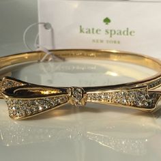 New Authentic Kate Spade Pave Bow Bracelet. 14 Karat Gold Plated. Clear Crystals Pave-Set In Elegant Bow And Channel Set In The Band. 7 " Circumference. Bow Length 1.75 " . Hinge Opening. See Matching: Kate Spade Gold Bow Earrings In My Closet. Kate Spade Gold Bracelets, Kate Spade Gold Bracelet Jewelry, Kate Spade Bangle Bracelet For Formal Occasions, Kate Spade Formal Bangle Bracelets, Kate Spade Formal Bangle Bracelet, Silver Kate Spade Bangle Bracelet, Kate Spade Adjustable Gold Bracelets, Kate Spade Bangle Bracelets For Party, Kate Spade Bangle For Party