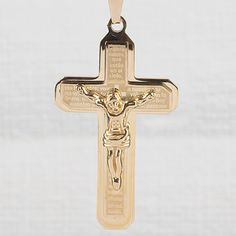 This iconic crucifix is elevated to a new level and meaning. Crafted in stainless steel and lavishly plated in 18k yellow gold. This timeless traditional style features engraved upon it, the Lord’s Prayer ‘Padre Nuestro’. A unique an elegant look to represent your faith. Gold Crucifix Cross Necklace With Polished Finish, Gold Crucifix Necklace With Polished Finish, Luxury Gold Crucifix Cross Necklace, Gold Engraved Crucifix Cross Necklace, Classic Gold Crucifix Cross Necklace, Engraved Gold Crucifix Necklace, Gold Engraved Crucifix Necklace, Gold Crucifix Cross Necklace In Stainless Steel, Gold Stainless Steel Crucifix Cross Necklace