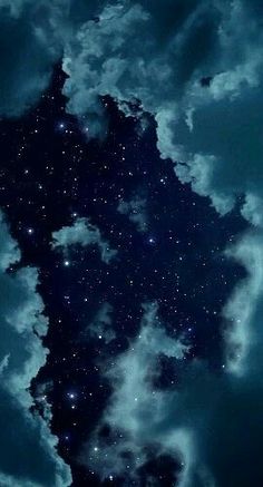 the sky is filled with stars and clouds