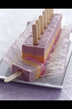 an image of food on a plate with toothpicks