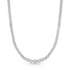 A ravishing choice, this sparkling diamond tennis necklace is a high-fashion look she won't want to take off. Crafted in 14K white gold, this exquisite style features round composites of dazzling diamonds that graduate in size as the look lengthens. Radiant with 7 cts. t.w. of brilliant diamonds and a bright polished shine, this delectible design measures 16.0 inches in length and secures with a tongue and groove clasp. Single Strand Round Cut Diamond Necklace, Classic Lab Grown Diamond Tennis Necklace For Anniversary, Classic Tennis Necklace With Lab Grown Diamonds For Anniversary, Classic Tennis Necklace With Lab-grown Diamonds For Anniversary, Dazzling Single Strand Round Cut Diamond Necklace, Diamond White Single Strand Tennis Necklace For Anniversary, Anniversary Tennis Necklace In Diamond White With Brilliant Cut, Classic Oval Diamond Tennis Necklace, Diamond Solitaire Necklace, Single Strand For Anniversary