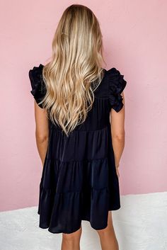 Black Ruffle Flutter Sleeve Pleated Tiered Mini Dress Chic Solid Color Tiered Mini Dress, Solid Ruffled Mini Dress For Brunch, Solid Color Ruffled Mini Dress For Brunch, Solid Mini Dress With Ruffles For Brunch, Chic Black Ruffle Dress With Ruffle Hem, Black Tiered Dress For Spring, Elegant Black Tiered Dress With Ruffle Hem, Ruffled Tiered Mini Dress In Solid Color, Chic Puff Sleeve Ruffle Dress For Brunch