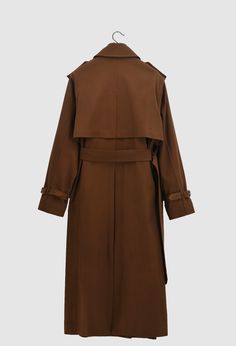 Heavy wool gabardine trench coat in walnut. 76% wool 24% cotton Dry clean only Made in New York City SIZE AND MEASUREMENTS View size and measurement chart here Gucci Trench Coat, Trench Coat Back, Trent Coat, Brown Trench Coat, Wool Trench Coat, Measurement Chart, Retro 90s, Clothing Ideas, Trench Coats