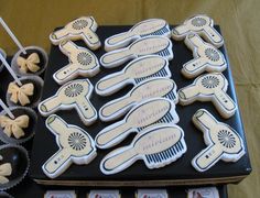 decorated cookies in the shape of hair combs