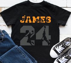 Basketball Shirt Personalized with Name and Number This is the tee that you've been looking for, and it's bound to become a favorite in any youngsters wardrobe. Its light, soft, and comes with a unique design that stands out from the crowd wherever you go! • 100% combed and ring-spun cotton Old Basketball, Book Themed Birthday Party, Superhero Printables, Movie Birthday, Basketball T Shirt, Dinosaur Shirt, Custom Basketball