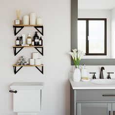 a bathroom with two shelves on the wall