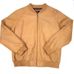 G-Gator Lambskin Varsity Jacket Material(s): Leather, Cotton Style: Bomber Color(s):Tan Beige Leather Jacket With Zipper Closure, Fall Beige Leather Outerwear, Beige Leather Long Sleeve Outerwear, Beige Leather Outerwear With Zipper Closure, Beige Leather Biker Jacket For Fall, Luxury Beige Leather Outerwear, Fall Cognac Leather Outerwear, Cognac Leather Outerwear For Fall, Beige Leather Biker Jacket For Work