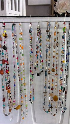 Each of these necklaces is carefully handmade with beautifully diverse and high-quality glass beads, some of which are hand painted, twisted, edged, faceted and finished with tiny seed beads in between. 😱😳 Every design is one-of-a-kind, with something that makes her extra unique: metal accents, large accent beads, color theme, single or double stranded. Some are color-themed but all are completely made of glass down to the tiny seed beads.   Just beautiful! Unless otherwise noted, every necklace is a single strand that can easily be doubled. Unique Long Beaded Necklace With Faceted Beads, Artisan Multicolor Czech Glass Beaded Necklaces, Artsy Multicolor Round Bead Necklaces, Spiritual Glass Beaded Necklaces With Polished Beads, Spiritual Glass Beaded Necklaces With Oval Beads, Spiritual Beaded Necklace With Oval Glass Beads, Spiritual Glass Beaded Necklace With Polished Beads, Artsy Multicolor Round Beads Necklace, Spiritual Oval Glass Beaded Necklaces