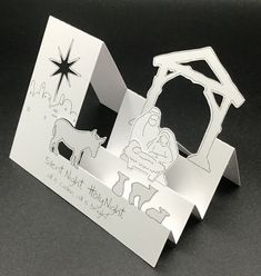 an origami nativity scene with the birth of jesus