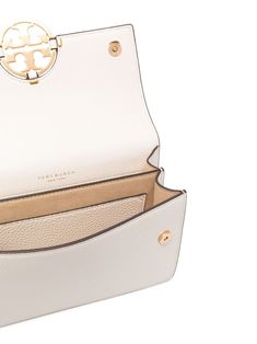 Ivory white leather Miller crossbody bag from TORY BURCH featuring leather and chain-link shoulder strap, gold-tone logo plaque, foldover top with magnetic fastening, main compartment and internal slip pocket. | Tory Burch Miller crossbody bag Tory Burch Miller, Ivory White, Continental Wallet, White Leather, Chain Link, Tory Burch, Crossbody Bag, Shoulder Strap, Wallet