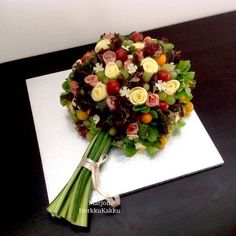 a bridal bouquet sitting on top of a table