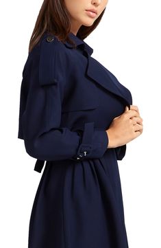 This modern trench is updated in a cool cropped silhouette and fitted with epaulets and belted cuffs. Open front Notched lapels Belted cuffs Epaulets Lined 92% polyester, 8% elastane Hand wash, dry flat Imported Chic Collared Belted Outerwear, Chic Belted Collared Outerwear, Chic Tailored Outerwear With Belted Cuffs, Belted Long Sleeve Outerwear For Business Casual, Notch Lapel Belted Outerwear For Business Casual, Belted Notch Lapel Outerwear For Business Casual, Belted Solid Workwear Outerwear, Belted Solid Outerwear For Work, Business Casual Outerwear With Belted Cuffs And Lapel Collar