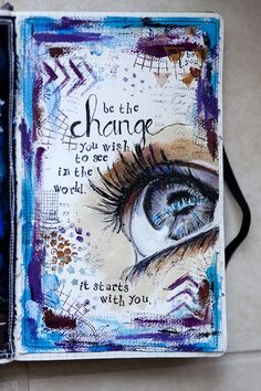 the inside of an art journal with blue and purple designs