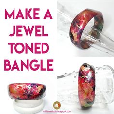 an advertisement for jewelry made with glass and acrylic paint on the inside of it