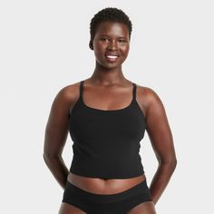 Give your everyday intimates a comfy upgrade with this Cotton Stretch Crop Cami Bralette from Auden™. This crop cami bralette is made of cotton jersey fabric with added spandex for a flexible fit that moves with you, while opaque lining provides extra coverage. The adjustable straps help you find the right fit, and unlined, wireless cups round out the design for support that maintains a natural, comfortable shape. Plus, removable padding provides a customized coverage. Auden™: Comfort true to ev Stretch Crop Top With Built-in Bra For Everyday, Black Cotton Sports Bra With Built-in Bra, Medium Support Cami Sports Bra With Built-in Bra, Medium Support Camisole With Built-in Bra, Solid Camisole With Built-in Bra For Loungewear, Camisole With Built-in Bra For Loungewear, Medium Support Camisole Tank Top With Built-in Bra, Stretch Seamless Camisole For Everyday, Stretch Everyday Crop Top Bra Friendly