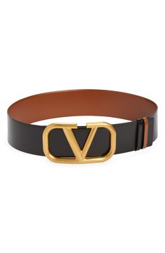 An archival VLOGO buckle boldly brands a smooth calfskin belt that reverses for double the styling options. 2 3/4" belt width; 6" x 3 1/2" buckle Leather Made in Italy Fashion Pics, Fashion Pictures, Accessories Jewelry, Valentino Garavani, Leather Belt, Calf Skin, Top Brands, Jewelry Accessories, In Italy