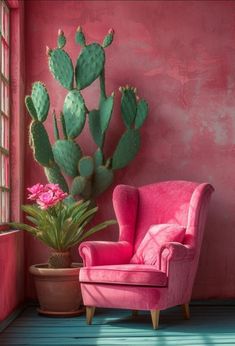 a pink chair sitting in front of a window next to a potted cactus on the floor