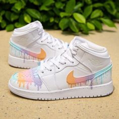 Be bold and show off your style with the Rainbow Drip Custom Air Jordan 1. This one-of-a-kind sneaker features an electrifying rainbow drip effect that will surely turn heads. Step up your game and step into the spotlight. 🤩 Exactly as shown in the pictures. 📷 Brand New & Authentic. 💯 Hand Painted with attention to detail. 👨‍🎨 Waterproof and Flexible. ❤️ Unisex model. Please refer to the Size Chart. 👟👫 Free Worldwide Shipping. ✈️🌍 Multicolor Custom Sneakers With Paint Splatter For Streetwear, Sporty Multicolor Sneakers With Paint Splatter, Sporty Multicolor Paint Splatter Sneakers, Multicolor Paint Splatter Sneakers For Sports, Rainbow Low-top Custom Sneakers For Streetwear, Rainbow Low-top Sneakers For Streetwear, Sporty Multicolor Custom Sneakers With Paint Splatter, Multicolor Low-top Sneakers With Paint Splatter, Multicolor Waterproof High-top Sneakers