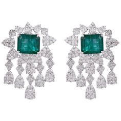 These exquisite earrings are handcrafted in 18-karat gold. It is set in 11.90 carats emerald and 7.20 carats of sparkling diamonds. FOLLOW MEGHNA JEWELS storefront to view the latest collection & exclusive pieces. Meghna Jewels is proudly rated as a Top Seller on 1stDibs with 5 star customer reviews. All items manufactured by us are handmade and can be customized or redesigned. Certificate available upon request. Composition Total Weight :- 20.36 gm 18k White Gold Weight :- 16.54 gm Diamond Weig Diamond Chandelier Earrings, Gold Chandelier Earrings, Diamond Earrings Design, Diamond Dangle Earrings, Edgar Degas, Handmade Fashion Jewelry, Gold Chandelier, Emerald Earrings, Diamond Hoop Earrings