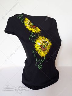 ♥Hand Painted Tshirt, Sunflowers T-shirt, SUNFLOWER Top, Hanpainted Floral TSHIRT, Summer Hand Painted Sunflowers T Shirt, Woman's t shirt♥ HAND PAINTED T-SHIRT by DiqnaDesign. Because these are Original Hand Painted Designs I will not guarantee that each t-shirt is exactly the same. The nature of hand painted designs is that each one is just a little different. ------- SIZE & DETAILS ------- Cotton T-shirts - hand painted with professional water resistant textile paint Available sizes: S, M Artistic Black Tops For Spring, Hand Painted Short Sleeve Cotton Top, Hand Painted Cotton Short Sleeve Top, Artistic Cotton Floral Print Tops, Artistic Cotton Tops With Floral Print, Artistic Cotton Top With Floral Print, Hand Painted Short Sleeve Graphic Tee, Artistic Hand Painted Short Sleeve T-shirt, Hand-painted Crew Neck Tops For Summer