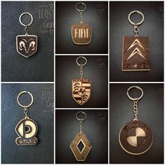 six different types of metal keychains with various logos on them, all in gold and silver