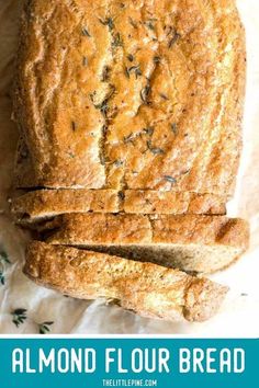 a loaf of bread sitting on top of a piece of paper with the words almond flour bread