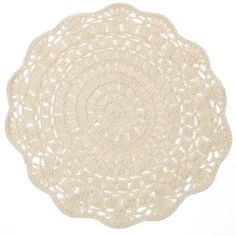 a white doily on a white background