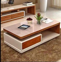 a living room with a coffee table and two end tables on carpeted flooring