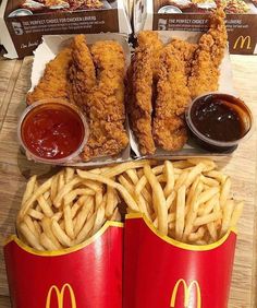 fried chicken and french fries with ketchup on the side at mcdonald's