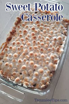 sweet potato casserole in a glass baking dish with marshmallows on top